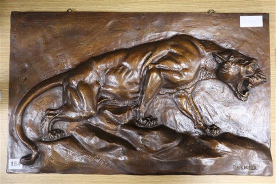 A bronzed plaster plaque of a tiger, signed TH. Cartier 37 x 59cm
